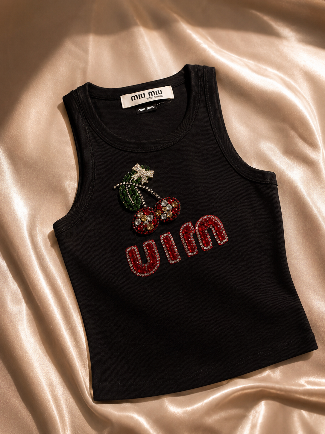 Top miumiu noir
